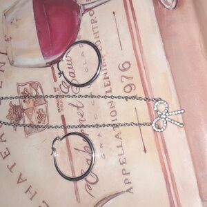 Silver-tone Bow tie necklace and hoop earrings